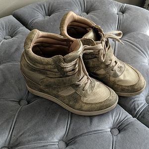 Gold wedge sneaker style shoes